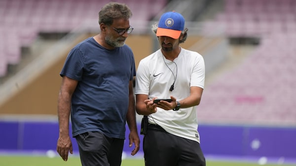 The sports director with filmmaker R Balki on the set of Ghoomer