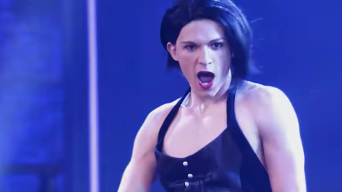 Tom Holland appeared alongwith Zendaya in an episode of Lip Sync Battles. Name the song he is seen lip syncing to in this image.