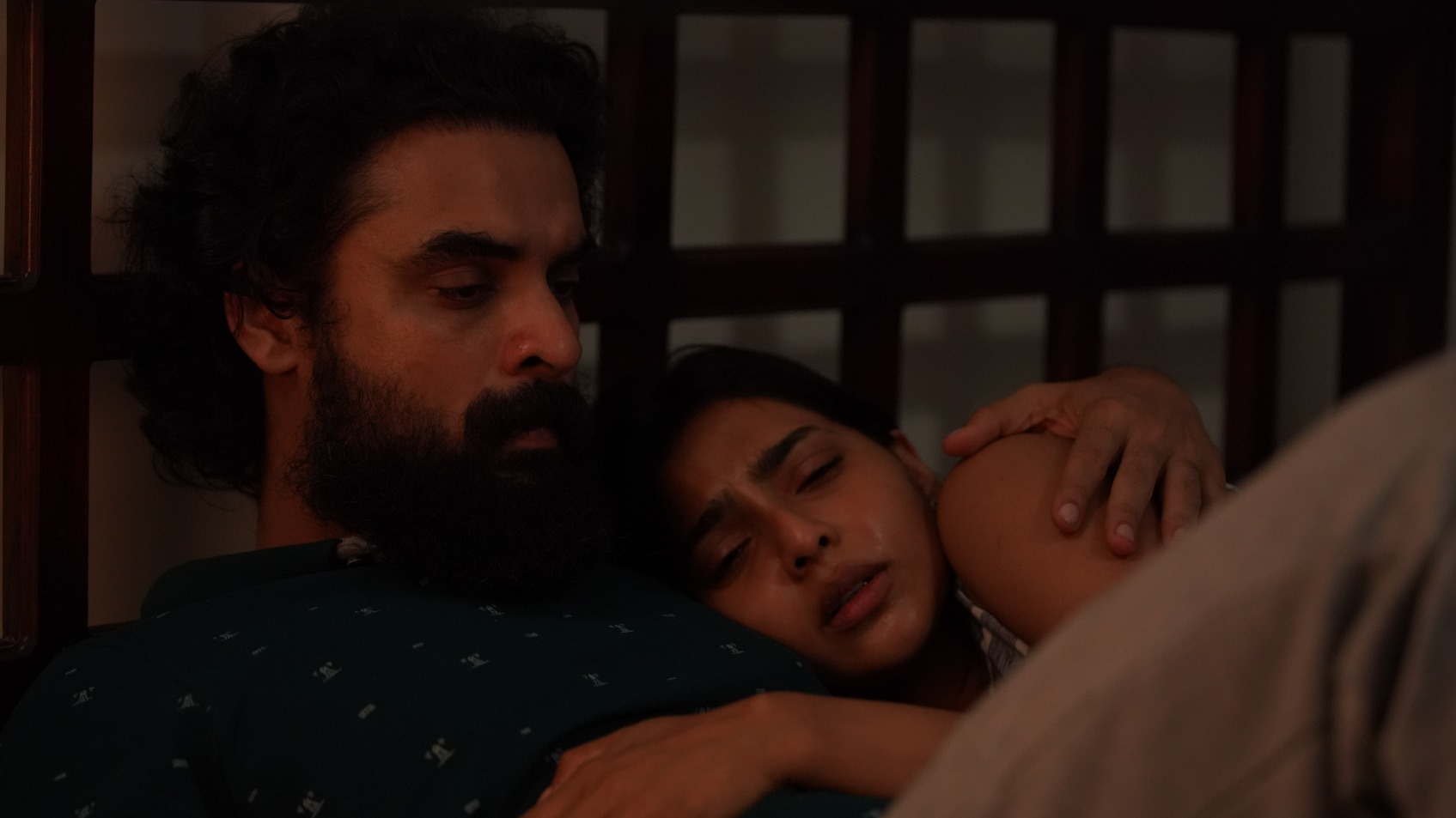 Tovino Thomas and Aishwarya Lekshmi in a still from Kaanekkaane