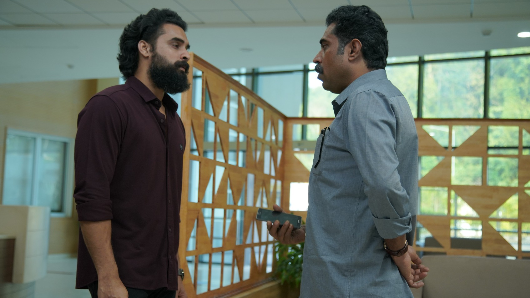 Tovino Thomas and Suraj Venjaramoodu in a still from Kaanekkaane