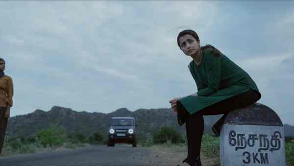 Trisha in a still from The Road