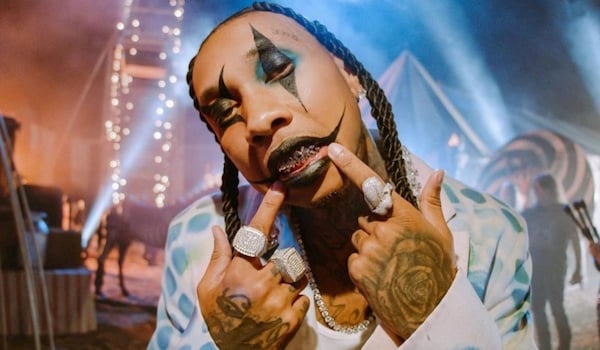 Tyga is ready to make you all shiver with his quirky Jester look for Halloween