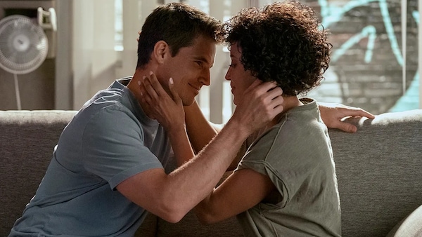 Robbie Amell and Andy Allo