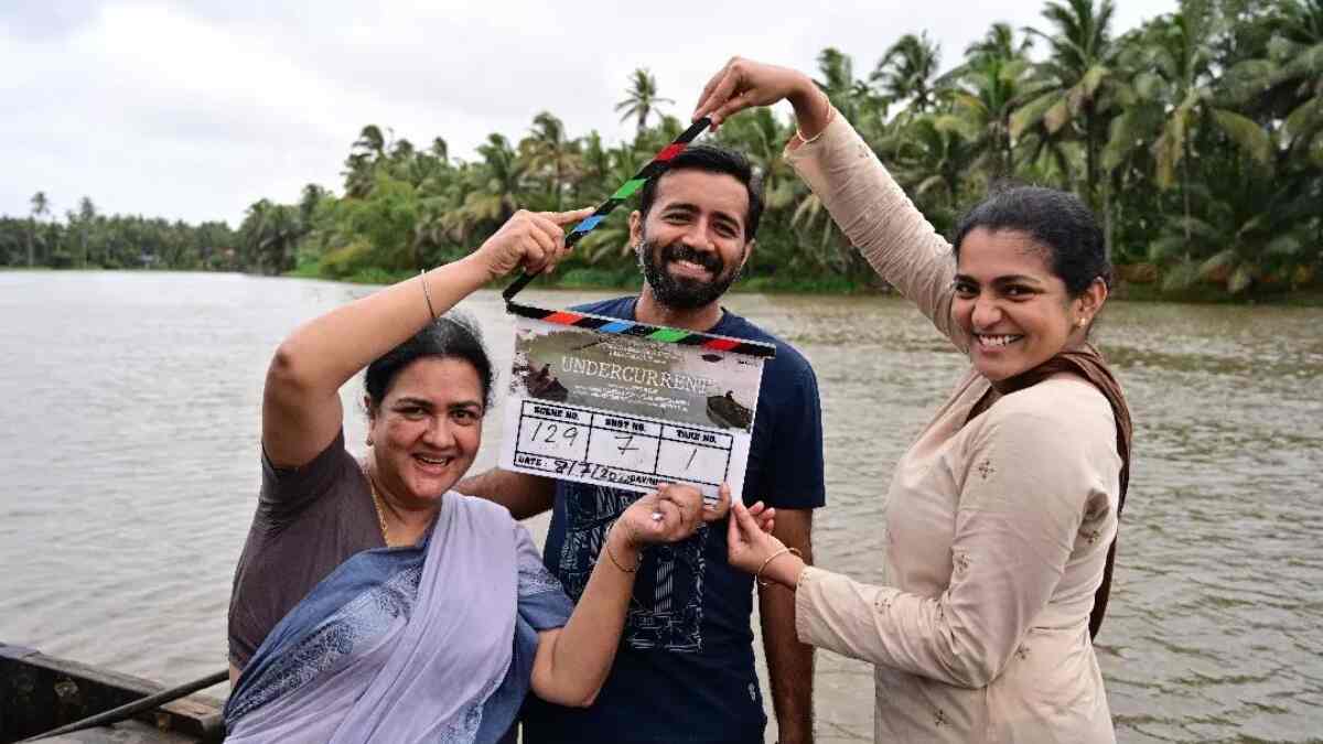 Ullozhukku – Latest glimpse shows an awkward Parvathy Thiruvothu and Prashanth Murali posing for photos