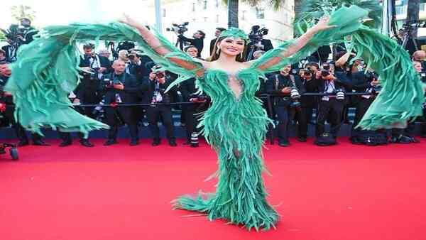 Urvashi Rautela trolled for her latest green feathered gown at Cannes 2023: Is she a parrot, jatayu, or Big Bird?