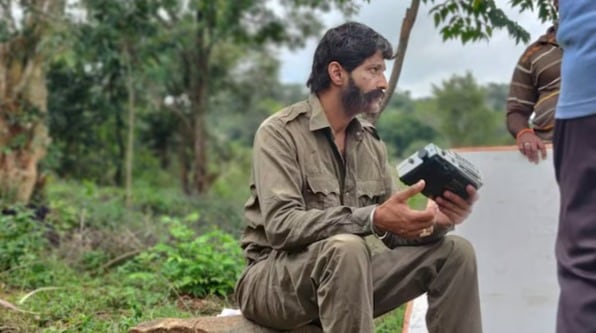 Kishore as Veerappan on the set of Veerappan Hunger for Killing
