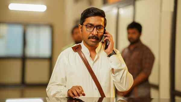 Vineeth Sreenivasan in a still from Mukundan Unni Associates