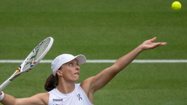 Iga Swiatek in action at Wimbledon