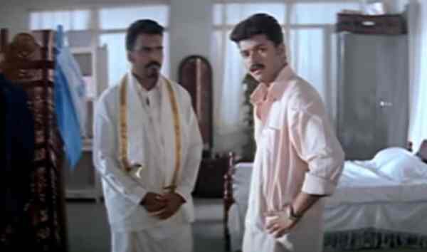 Yugendran with Vijay in a still from Thirupaachi (2005)