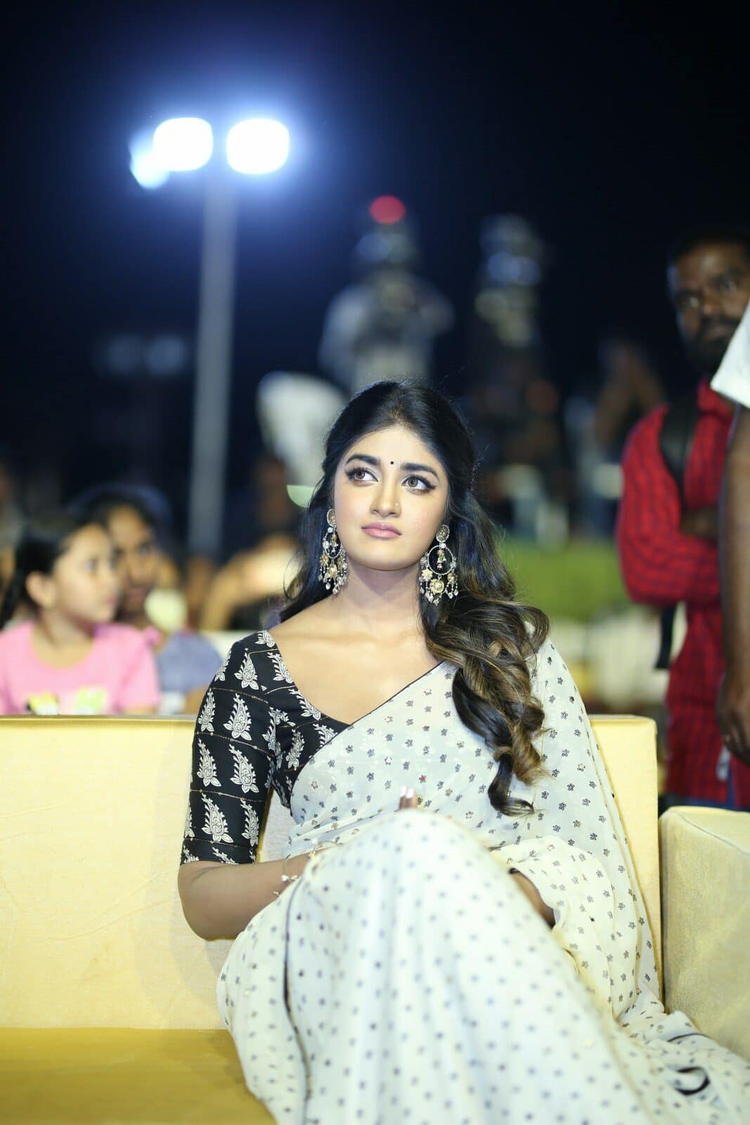 Dimple Hayathi is equally classy and hot in an off-white sari
