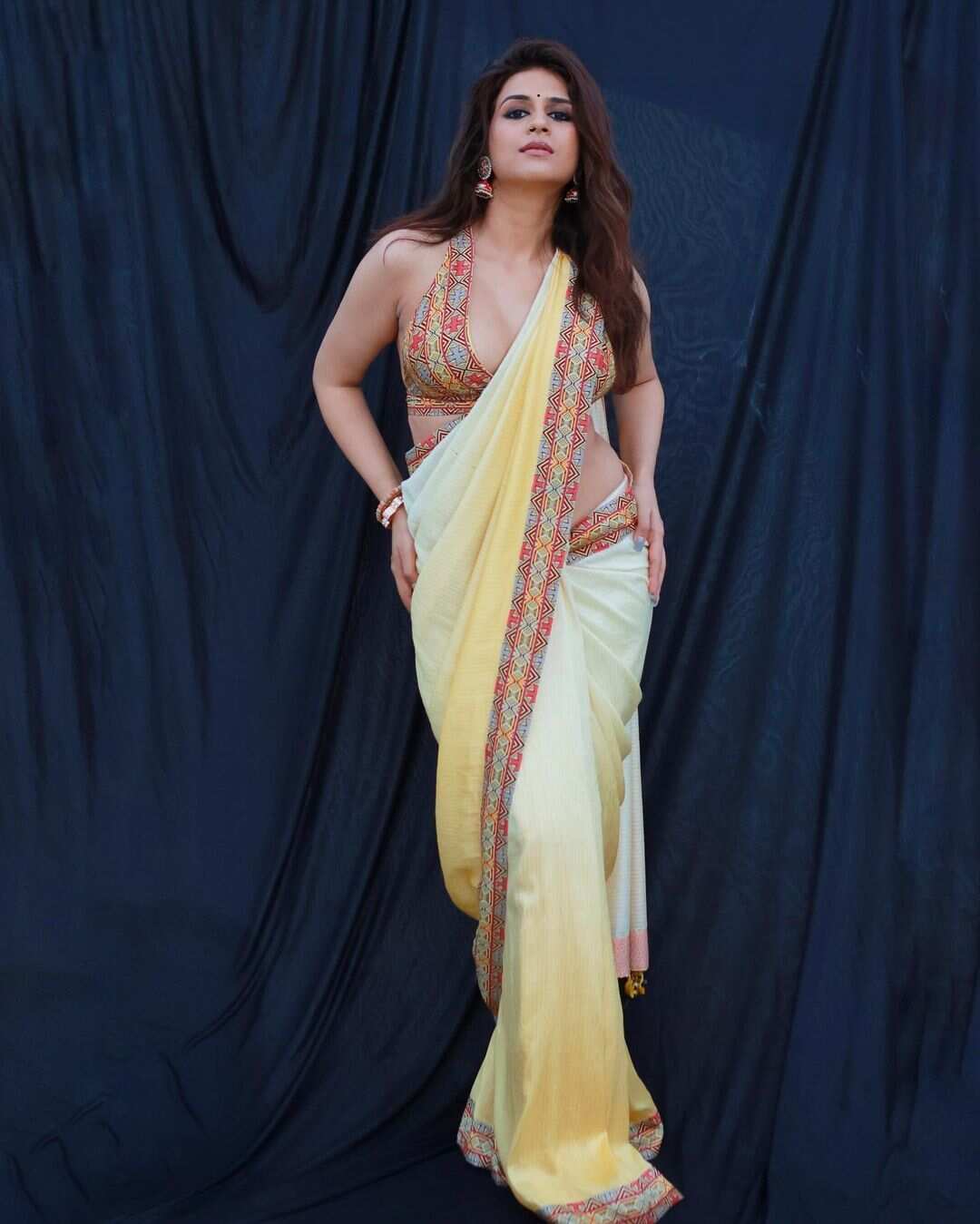 Shraddha Das casts a spell in a captivating yellow saree