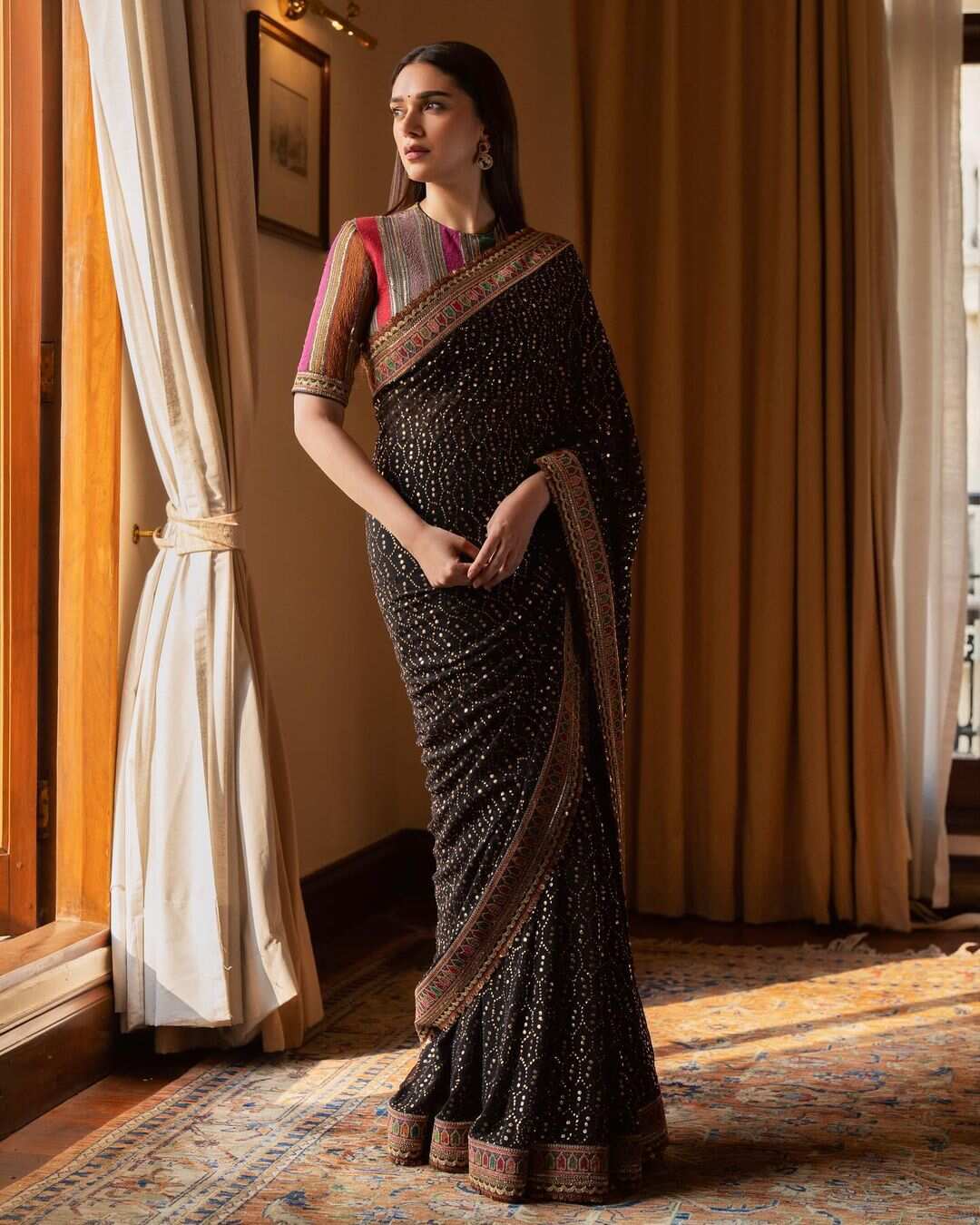 Zaira Black saree with Golden Black sequins work b | website