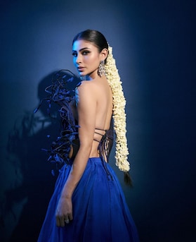8 times Mouni Roy stunned in floral hairstyles